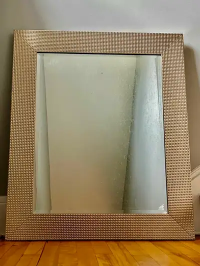 Wall Mirror in metallic finish. Excellent condition. 35.5"(h) x 29.5"(w).