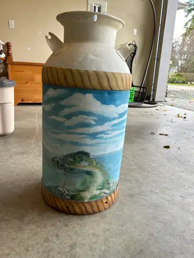 Milk Can with beautiful ocean art work painted on. 27” tall