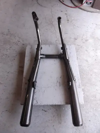 fits 1984 to 1987 models...was removed with under 500 kilometers from new as a 2 into 1 race type sy...