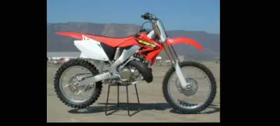 WANTED - Looking for an original Honda top triple clamp and silencer for 2003 CR250. Please reply to...