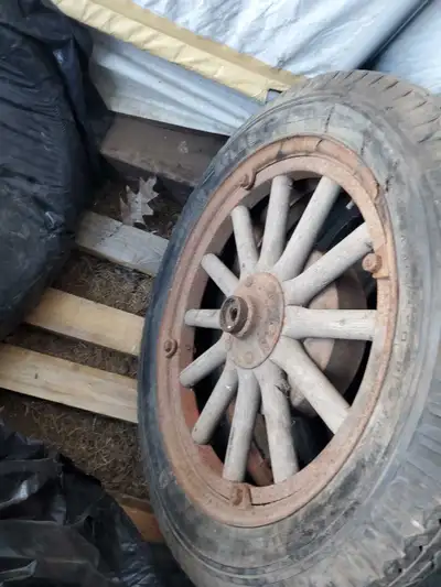 Misc Ford Model A and T Parts.. Wooden spoked.. metal spoked wheels.. split rims.. misc 21" tires.....