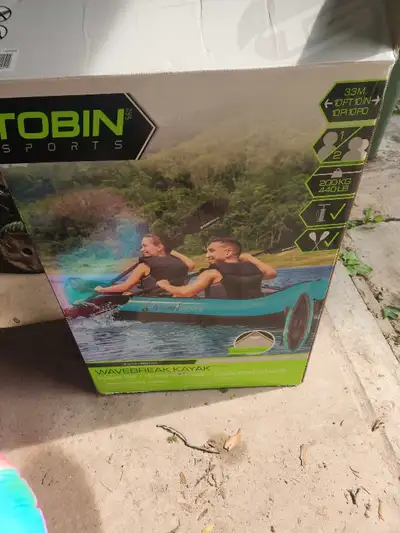 Get ready for some fun on the water with this used inflatable Tobin Sports Wavebreak Kayak, designed...