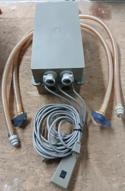 Dual electric air pump with twin controls. For inflatables.