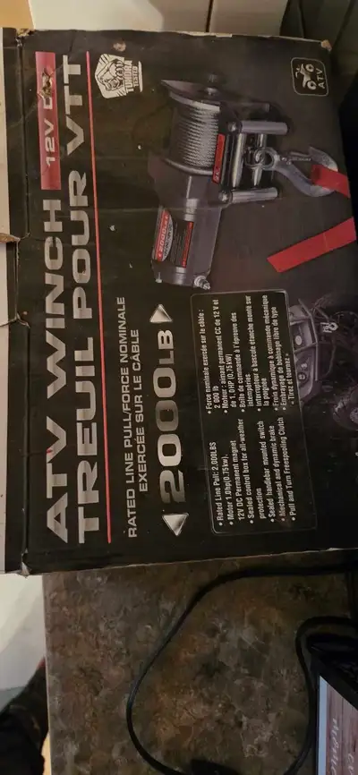 I'm selling an ATV Winch rated for a 2000lb pull force, perfect for getting your all-terrain vehicle...