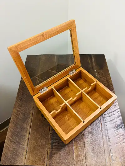 Elevate the presentation of your cherished jewelry or treasures with this sophisticated table top/va...