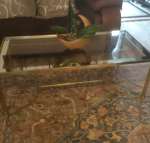 Gold coffee table with glass top L 39” X H 18” X D 19.5”63782599614721121