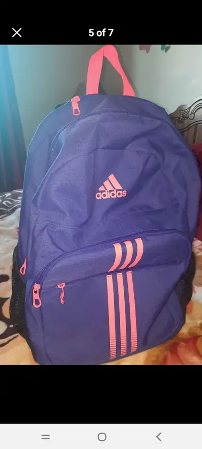 Purses and  adidas bag and MK Coat, View more
