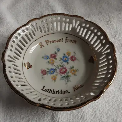 1.5" high x 5.25" wide. Open worked porcelain, Made in Germany. Excellent condition. Great gift or s...