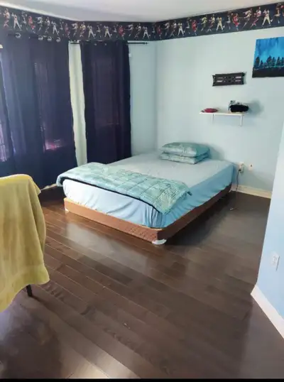 Private master room sharing bathroom. on the second floor of a clean home available from 1 November...