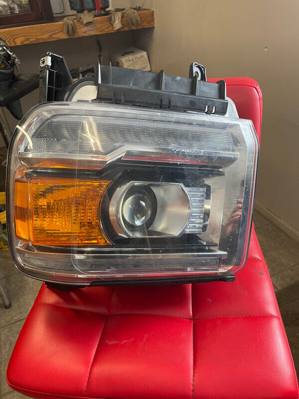 GMC 1500-2500 2014-2018 LEFT Headlight (2 available) in Auto Body Parts in Norfolk County