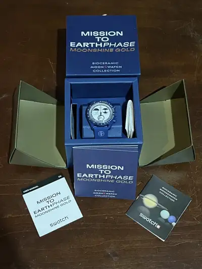 Omega Swatch Moonshine Gold Snoopy, View more