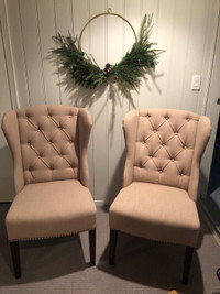 Wide tufted wingback chairs
