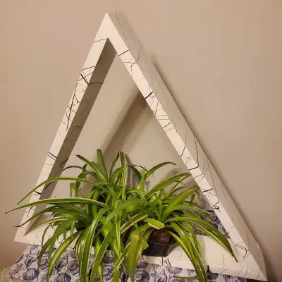 Pine triangle shelf. White with black splatter. H: 19" x W: 22" x D: 3.5" Made by Gonzo Factotum Che...
