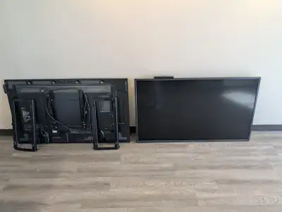 Selling a matching pair of heavy-duty NEC MultiSync V552 55-inch commercial-grade display monitors....