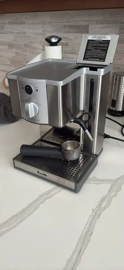 Elevate your morning routine with this reliable Breville Cafe Roma espresso machine, perfect for cra...