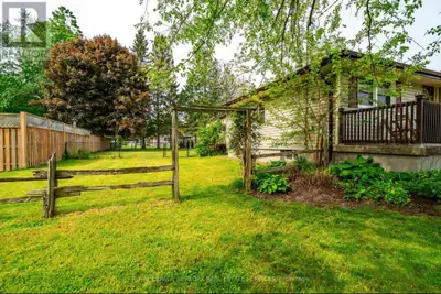 Beautiful, well kept bungalow just seconds from all amenities on a mature oversized lot. Check listi...