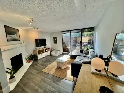 This light-filled 3-bedroom, 2-bathroom townhouse spans three levels and offers modern living in the...