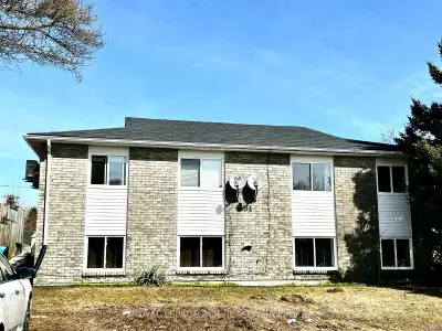An outstanding investment opportunity for a solid, updated fourplex, featuring 4 bright, separate 2...