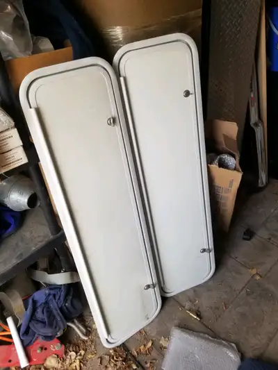 These are new but have been in storage new trailer storage doors 2-12 3/4x48 3/4 all measurements ar...