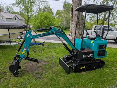 Mini excavator 15hp Gas engine Zero hours Pilot controls Weighs approx 2000lb Perfect for trenching...