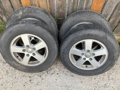 Set of four 215 70 16 nokian tires on 2008 and newer dodge caravan rims. Tires aren’t the best. Most...
