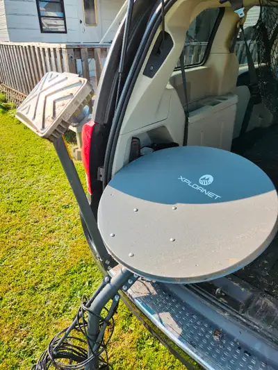 Xplornet satellite TV dish. Perfect condition, nevere used as I was able to get wireless. It comes w...