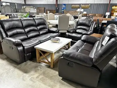 Sink into relaxation with this used reclining living room set, featuring a sofa, loveseat, and chair...