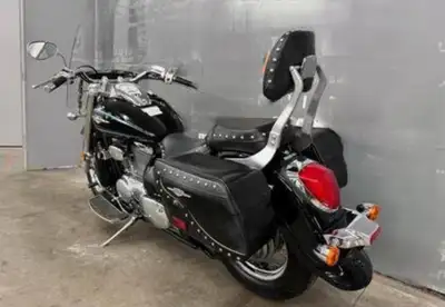 This is a Suzuki Boulevard C50T cruiser motorcycle, designed for comfortable long-distance riding, f...