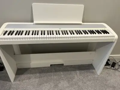 Korg Digital Piano with pedals. , View more