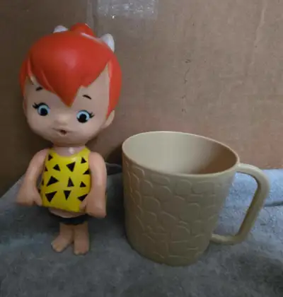 Pebbles doll, moveable body parts, with mug, straw is missing., View more