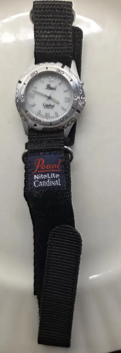 Mens Pearl watch by Cardinal, silver face, nylon adjustable strap with vecro New battery April 13th,...