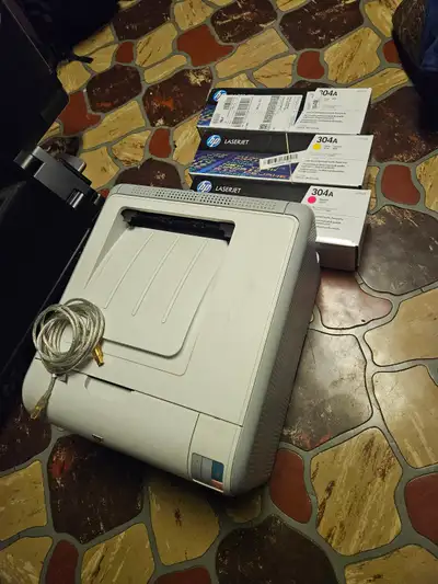 **HP Color LaserJet CP1215 Printer + NEW Toner** Selling an HP Color LaserJet CP1215 printer in good...