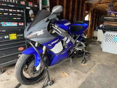 Bike needs a battery to get it running, needs front brake master to be rebuilt and head fairing need...