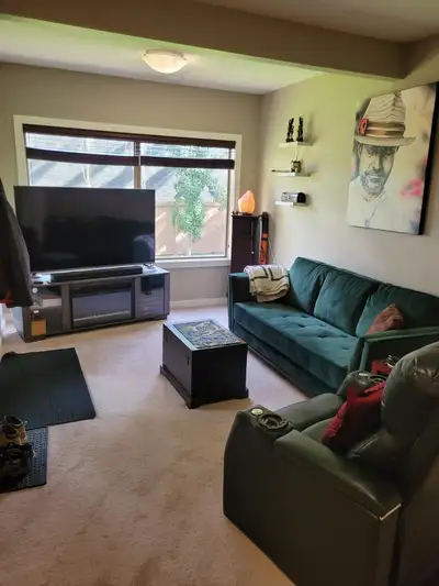2 bedroom walkout basement suite available now in Evergreen minutes away from fish creek park and al...