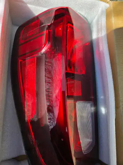 Selling a genuine OEM GMC Sierra Left Hand (Driver Side) Tail Lamp assembly in excellent condition....