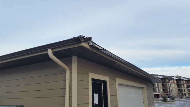 Eavestrough, soffit, fascia, gutter cleaning, shingles.  in Roofing in Edmonton - Image 4