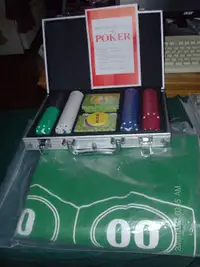 200pc. poker chips  w/ felt cloth. alum case, & card shuffler.