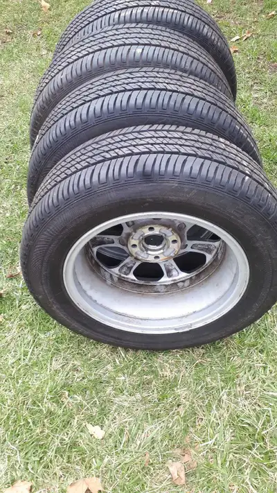 Set of ford rims and all season tires From a 2018 ford ecosport with sensors Tires are brigestone ec...