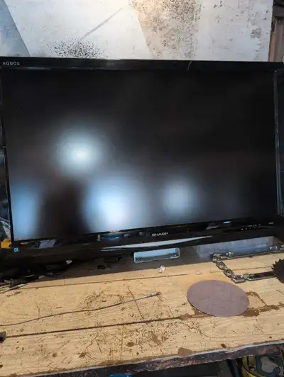 This is a used Sharp Aquos TV, offering reliable performance and a clear display for your viewing pl...