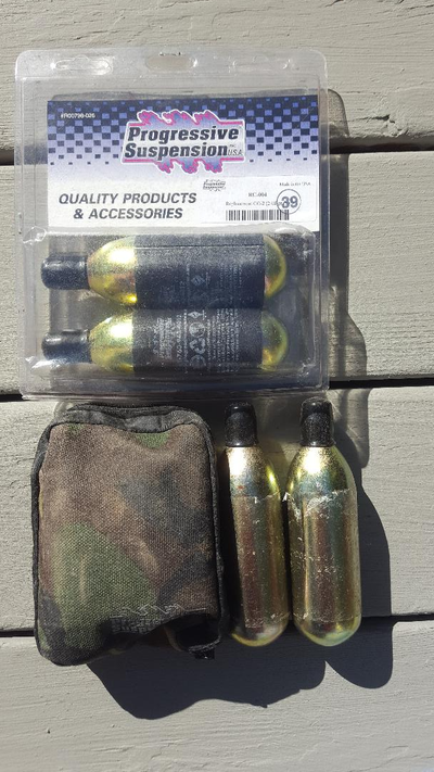 Never used! Emergency (roadside) motorcycle tire inflation kit. The kit includes five (5) cylinders...