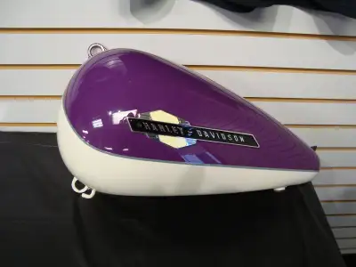 Left side , Harley Softail tank. Factory custom paint. Brand new. Never used.