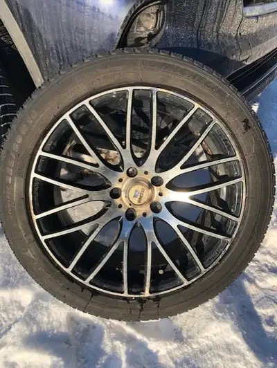 4 Michelin X ice 225/50 R18, on 5x112 bolt rims. Would be good for another season or 2. They were bo...