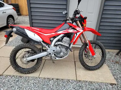 Just over 4k kms Runs great, ready for a new learner Completely stock other then heated grips.