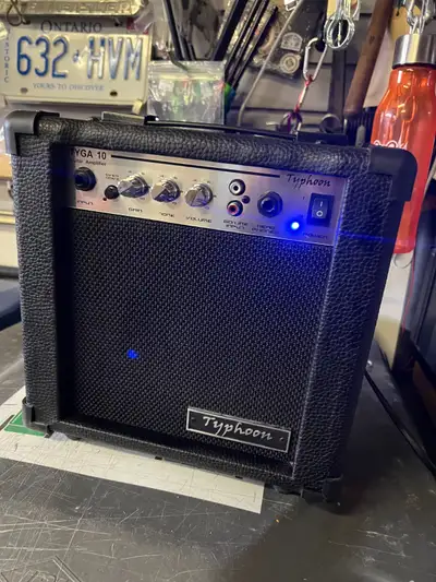 SMALL ELECTRIC GUITAR AMPLIFIER - TYPHOON YGA-10, View more