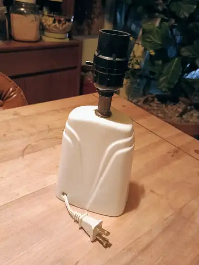 Small cute white table lamp.
