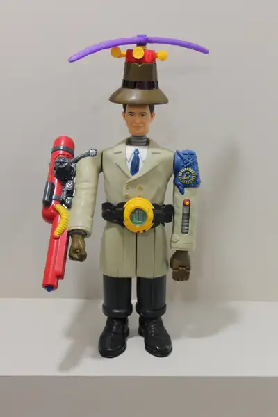 Older Inspector Gadget toy has the watch around the waist and the spinning hat which are quite often...
