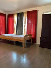 On a main floor of a house sharing room for rent