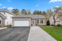 Immaculately Kept 4-bed, 3-bath Walk-out Basement Bungalow!
