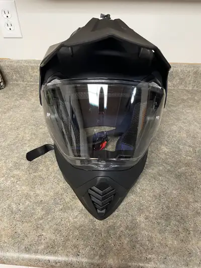 I have new a dual purpose motorcycle helmet with built-in sunshades. Medium size car text 403866947...