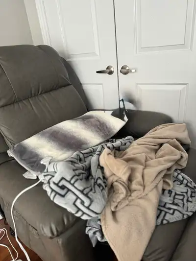 Lazy boy power lifter reclining chair with heat and massage. 3 year left on additional warranty paid...